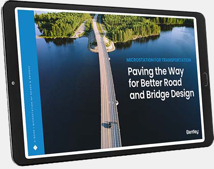 Tablet displaying a cover page with a road and bridge over water, titled "Paving the Way for Better Road and Bridge Design with MicroStation" by Bentley.